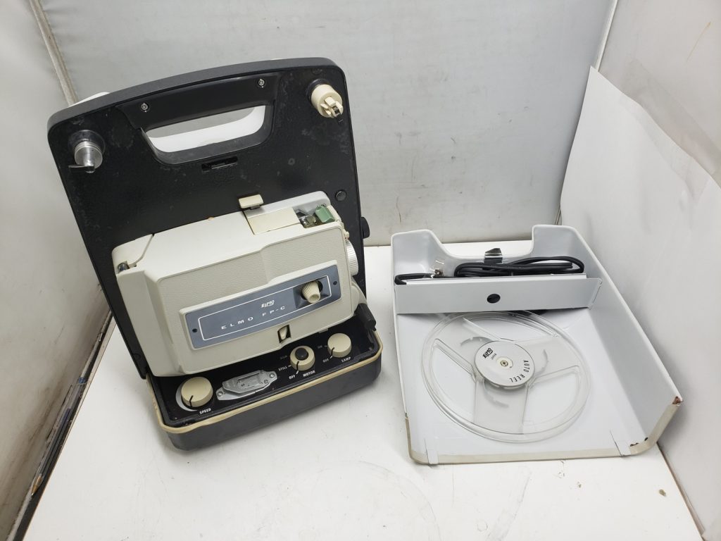 Projecteur 8mm ELMO FP-C vintage - besoin d'ampoule dans sa boîte d'origine