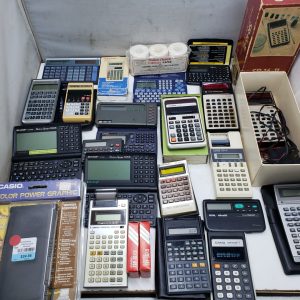 Collection de calculatrices vintage, electronic organizers, financial printer (Texas instrument, Casio, HP, etc)