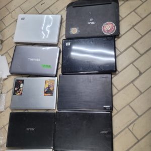 14 laptops FOR PARTS - no disks