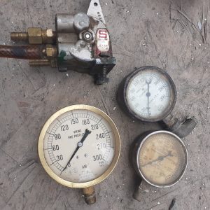 Set of industrial pressure gauges and valve for project