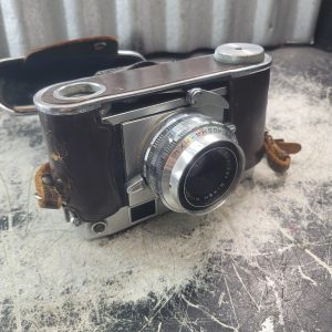 Appareil photo argentique télémétrique Ricoh 500 avec étui - pour pièces ou réparation